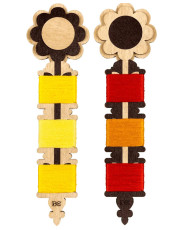 Plywood bobbins for threads, floss and ribbons.